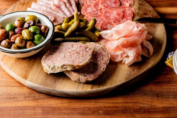 charcuterie,board.,cheese,board,assortment,on,cured,and,salted,deli